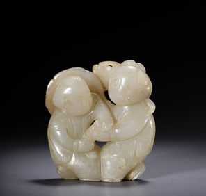 A piece of Hetian jade seed material holding lotus boy