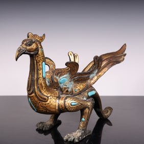 A piece of Han Dynasty bronze gilt phoenix bird