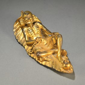 A piece of bronze gilt Dharma Arhat with a stick of incense