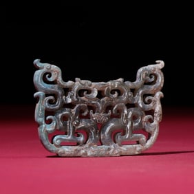 A piece of Warring States bronze jade dragon pendant