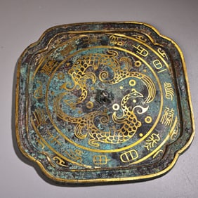 A piece of wrong gold bronze mirror