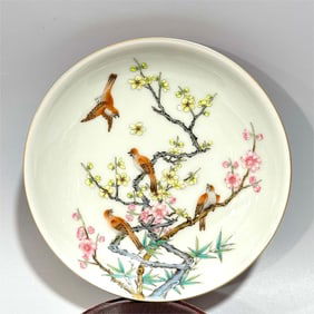 A enamel color carmine red painted flower and bird pattern plates made in the Yongzheng year