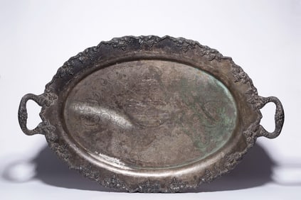 A baroque floral amphora in bronze and silver