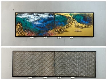 A screen of Zhang Daqian's ink-colored landscapes