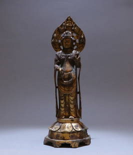 A bronze gilt Buddha statue of the Northern Wei Dynasty: Northern Wei Dynasty bronze gilt Buddha statue of the Northern Wei Dynasty Size: H:37cm L:12cm W:2040g (The Dimensions Of All Batches Are Manually Measured.If You Need More Detailed Information, Pleas