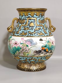 A bronze color mandarin duck playing in the water lotus amphora made in the Qianlong year of the
