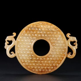 A piece of Hetian jade from the Han Dynasty and a double phoenix jade