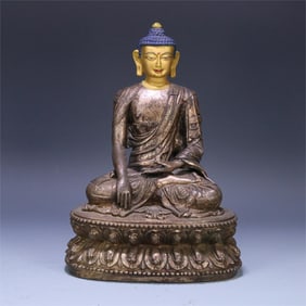 A bronze statue of Shakyamuni