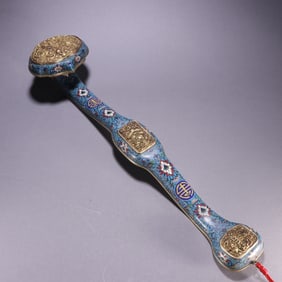 A piece of bronze gilt filigree painting enamel Fushou flower Ruyi from the Qing Dynasty