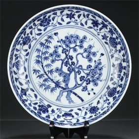 A delicate blue and white pine, bamboo, and plum pattern plate