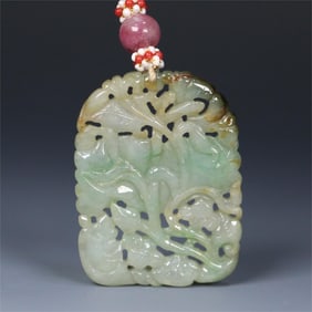 A beautiful old emerald lotus with a fish brand