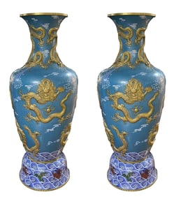 A pair of cloisonn é blue background longevity boundless brocade gold dragon engraved bottles