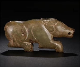 A piece of Hetian green jade cattle from Shang Zhou