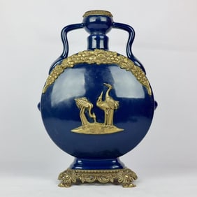 A beautiful sapphire blue glazed bronze crane amphora holding the moon