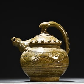 A Song Dynasty Yaozhou kiln entwined flower lion head inverted pot