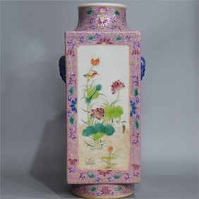 A beautiful square flat bottle with a round sky and a red ground enamel colored elephant ears