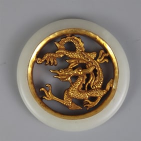 A fine bronze gilt jade ring