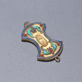 A bronze gilt turquoise fasting plaque from the Qing Dynasty