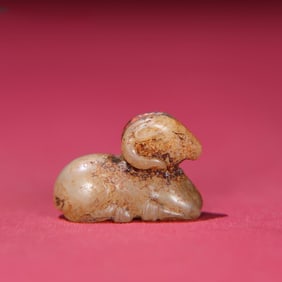 A piece of exquisite Hetian jade pit uncleaned jade sheep round carving ornaments