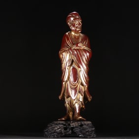 A small leaf red sandalwood depiction of gold Dharma ornaments from the Qing Dynasty