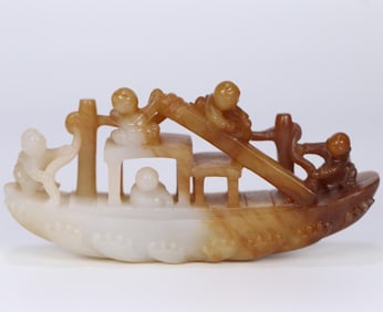 A delicate Hetian jade boat-shaped ornament