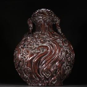 A flat bottle of agarwood from the Qing Dynasty