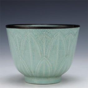 A sky blue glazed lotus petal pattern bowl from a Ru kiln in the Song Dynasty