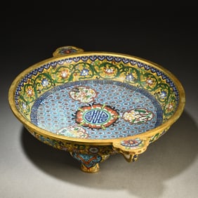 A Qianlong copper-gilt cloisonn é enamel color tuanshou three-legged plate