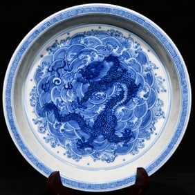 A piece of the Qing Dynasty Qianlong year of the blue and white seawater dragon pattern folded along