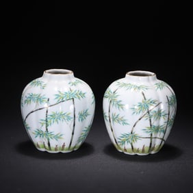 A pair of pastel bamboo jars made in the Qianlong year of the Qing Dynasty