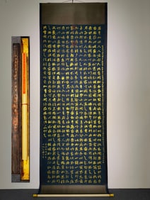 A vertical scroll of Zhao Zhiqian's eight-foot gold powder calligraphy on silk
