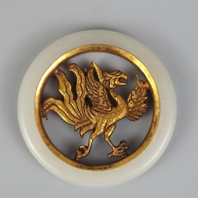 A fine bronze gilt jade ring