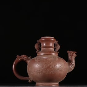 A purple sand flower and bird pattern teapot with Chen Mingyuan