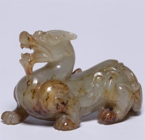 A piece of exquisite Hetian jade seed material with Qinrui beast
