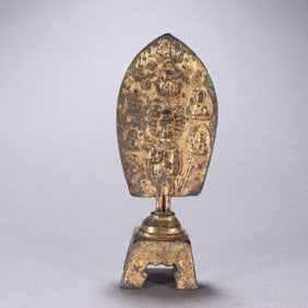 A bronze gilt bench Buddha from the Qing Dynasty