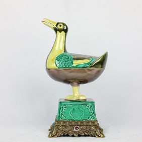A piece of the Ming Dynasty Chenghua year of the plain three-color inlaid copper-bottomed duck