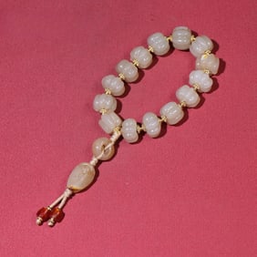 A piece of exquisite white jade melon beads