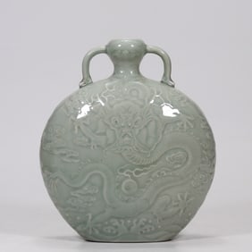 A pink and blue glazed embossed seawater dragon pattern amphora flat pot made in the Qianlong year
