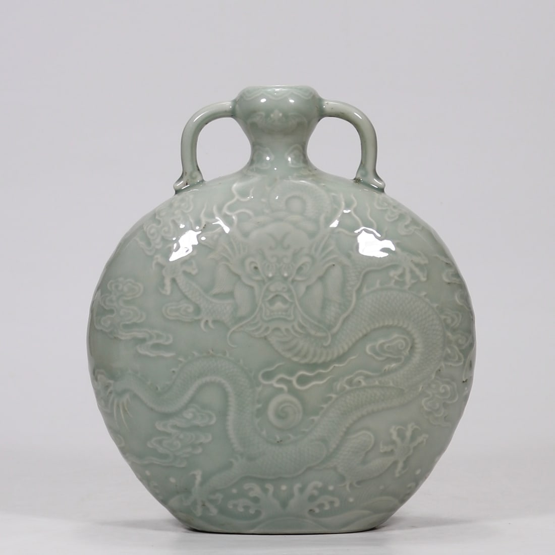 A pink and blue glazed embossed seawater dragon pattern amphora flat pot made in the Qianlong year: Qing Dynasty Qianlong year made pink blue glaze embossed seawater dragon pattern amphora flat pot SIZE: H:21.6cm (The Dimensions Of All Batches Are Manually Measured.If You Need More Detailed Informat