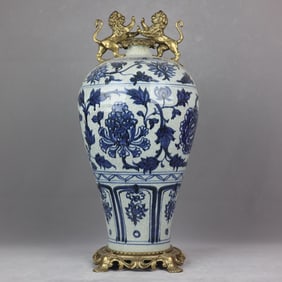 A blue and white entwined lotus pattern inlaid with copper lion amphora plum vase from the Yuan