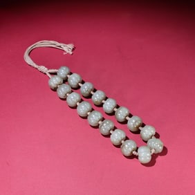 A delicate Hetian jade ripe pit seed material melon bead charm