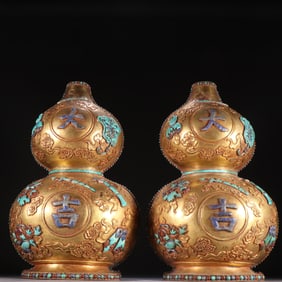 A pair of bronze gilt gem-encrusted Daji gourd wall vases from the Qing Dynasty