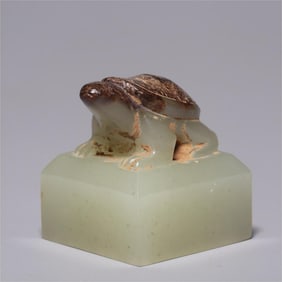 A fine Hetian jade with a turtle button seal