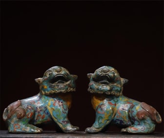 A pair of cloisonn é cloisonn é enamel lion ornaments in copper