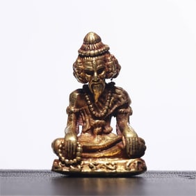 A small golden Buddha with nine faces in the Wei and Jin dynasties