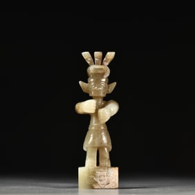 A delicate ornament of ancient jade figures