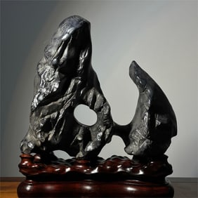 A delicate Taihu stone ornament