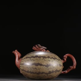 A purple sand watermelon-shaped teapot of Jiang Rong's style