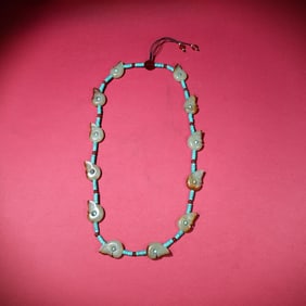 A beautiful pigdragon necklace