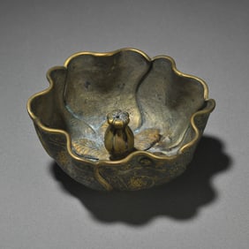A delicate gilt-gold silver floral pattern